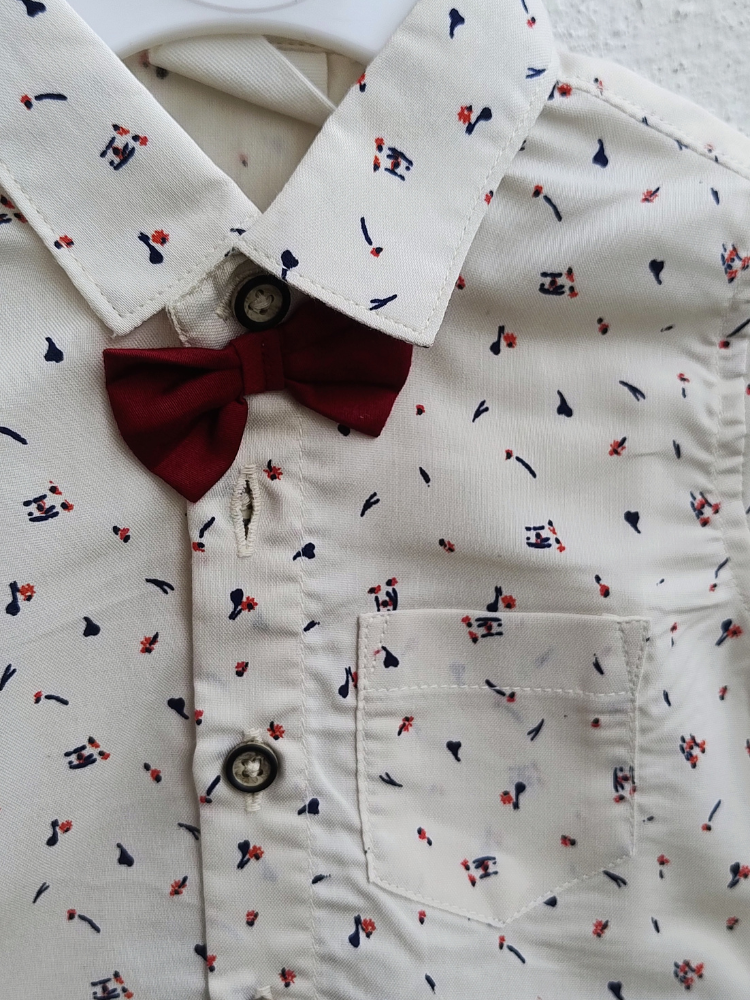 white shirt with shorts and bow