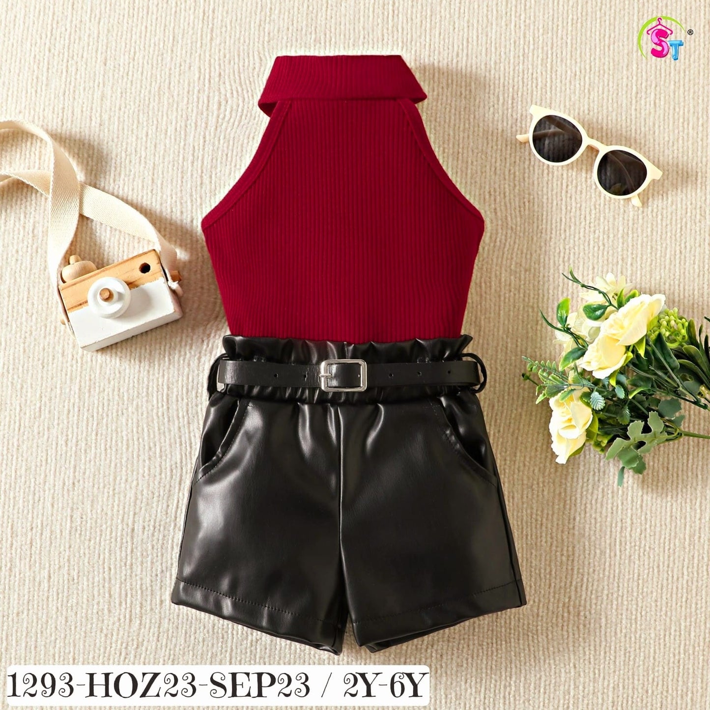 Halter neck top with leather shorts