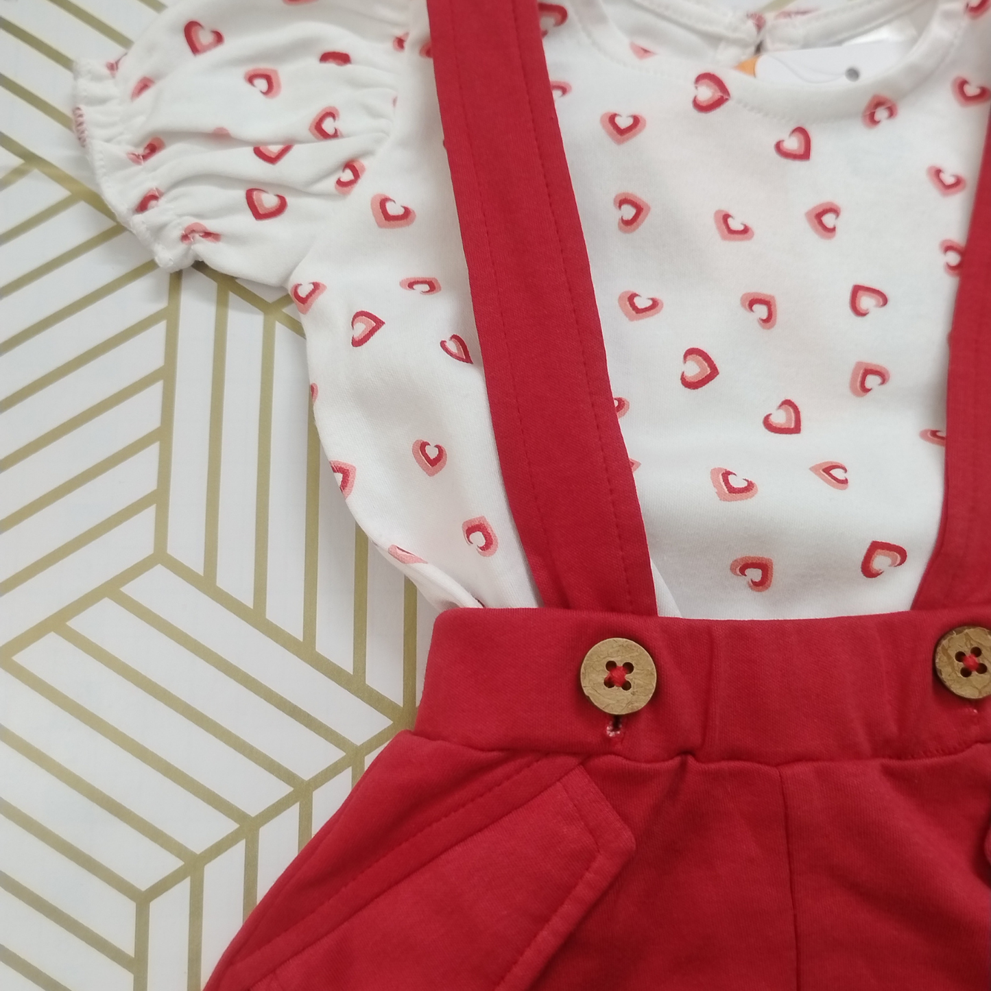Red and white pinafore dress